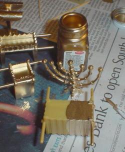 Photo of furniture items painted gold.